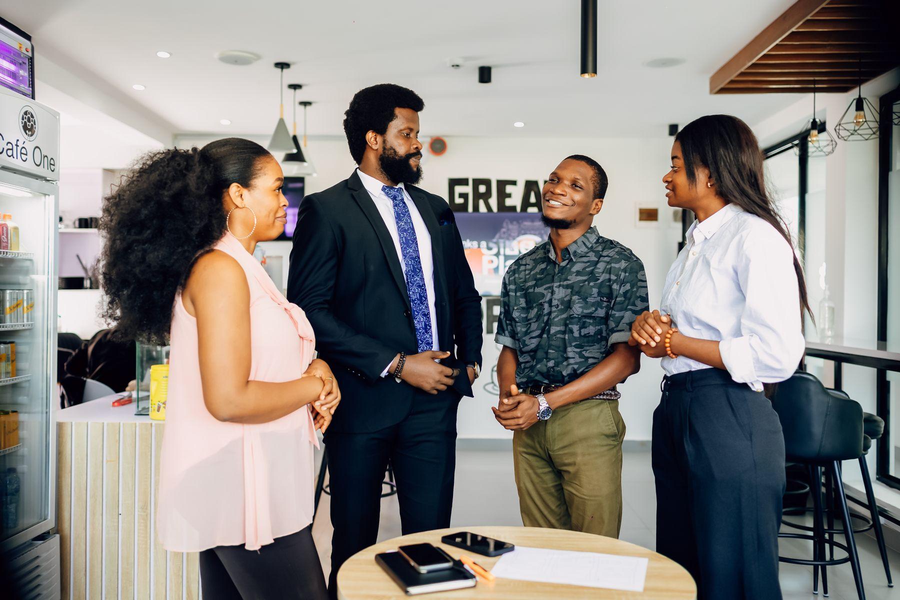 The Ify Junior Properties team meeting in the Abuja office