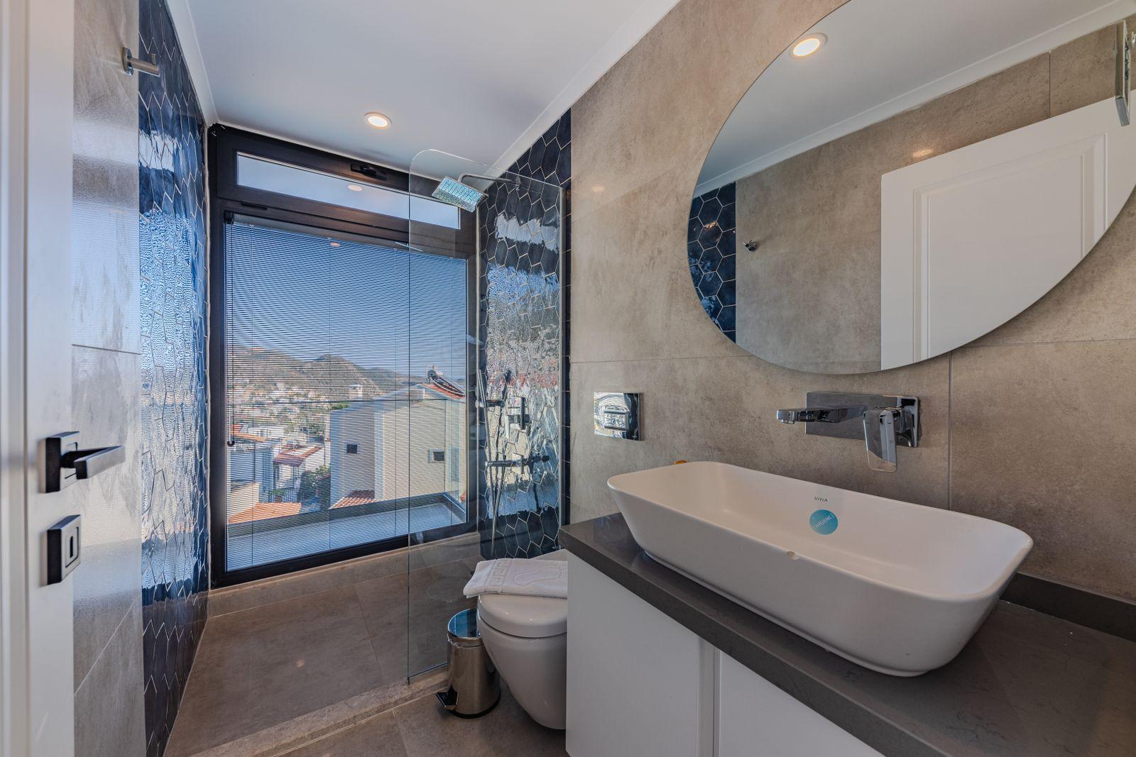 Contemporary bathroom with freestanding tub in an Ivory Court villa