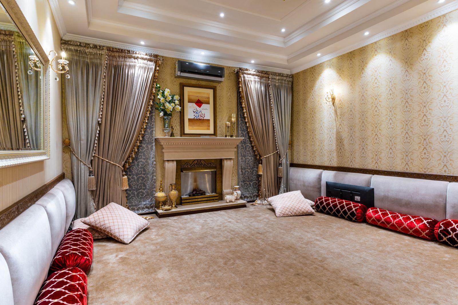 Living room in a Meridian Residences show apartment with floor-to-ceiling windows