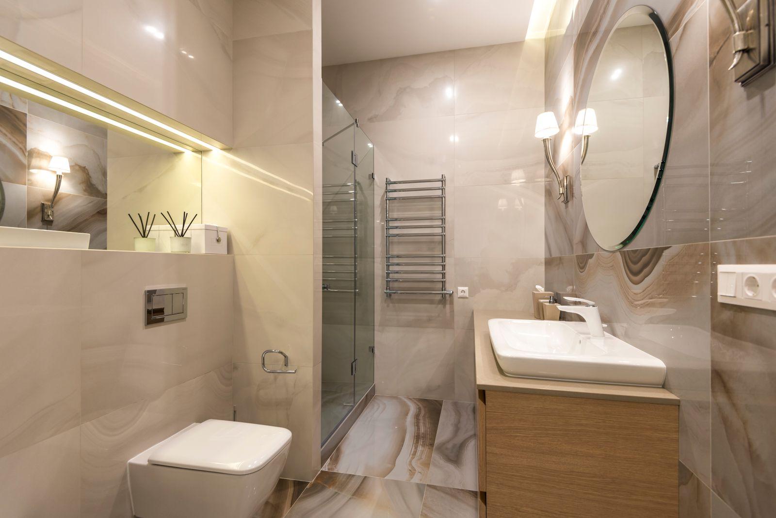 Marble bathroom with soaking tub in a Meridian Residences apartment